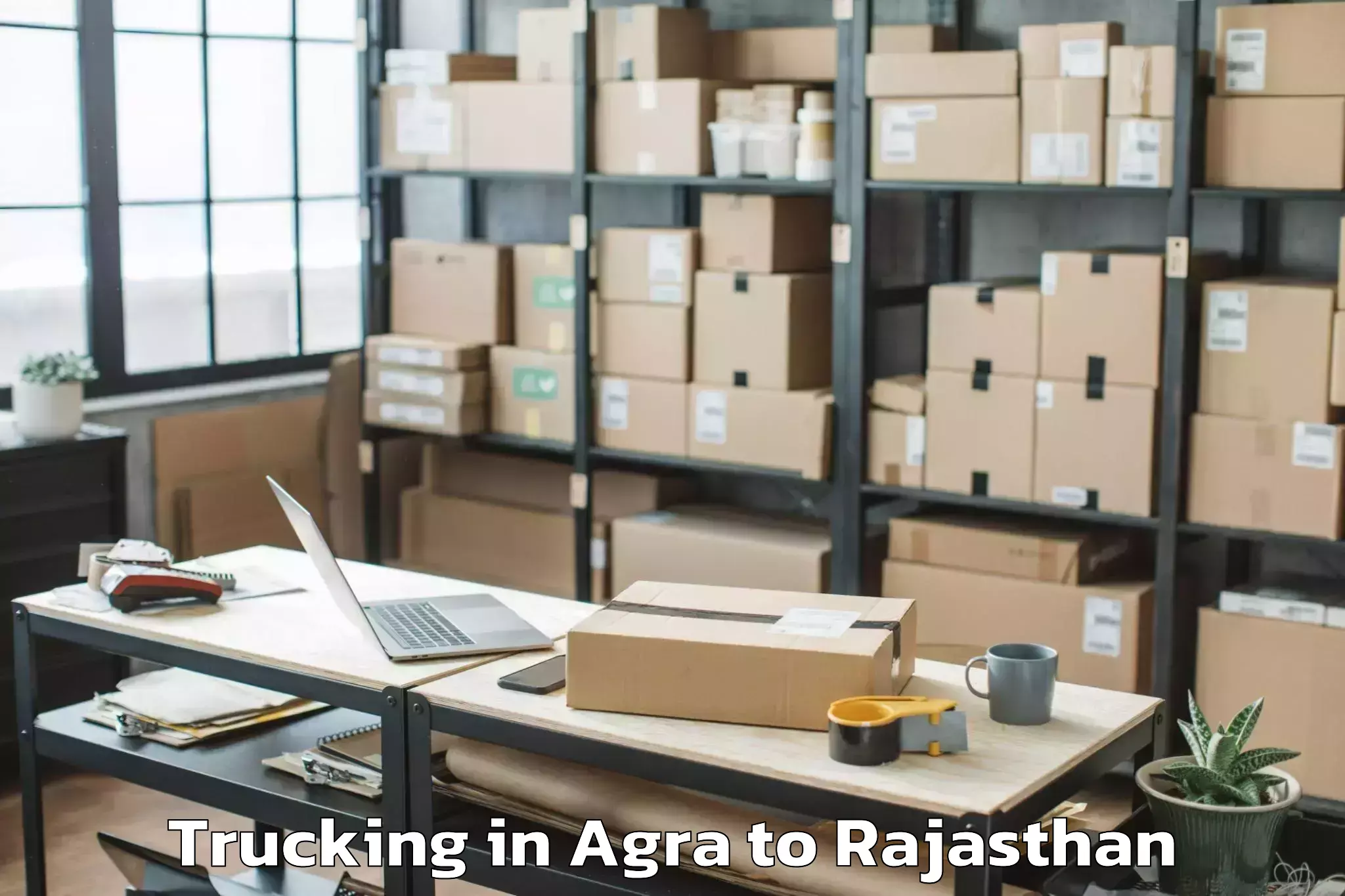 Top Agra to Ghatol Trucking Available